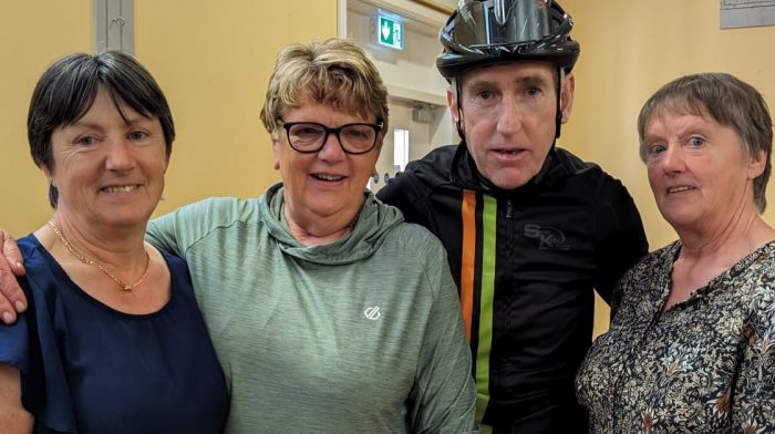 The three O’Brien sisters (from left) Mary Collins, Noreen Desmond and Margaret O’Brien volunteering at the charity cycle which passed through Ballinspittle and where they met renowned cyclist Sean Kelly.