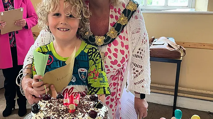 Jerry Mc Carthy, who won the U12 adjudicators prize, at the Clonakilty Macra Bake Off with master judge Mayor Eileen Sheppard. 