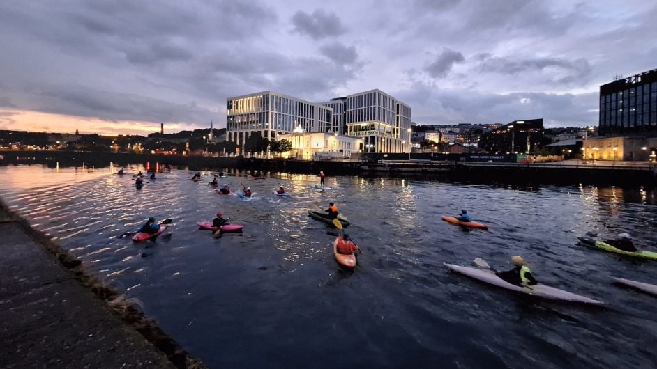 Paddling around the city in aid of the RNLI Image