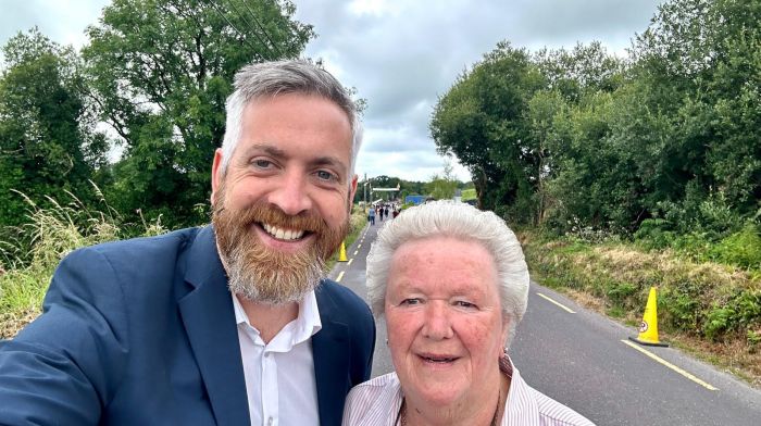 Christopher O’Sullivan TD and Margaret Daly enjoying the launch of the All-Ireland road bowling championships in Castletownkenneigh last Saturday morning.