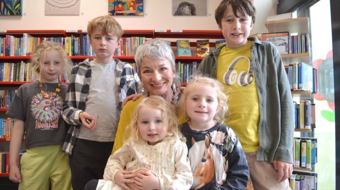 Skibbereen artist Nicola McCarthy with her nieces and nephews William, Christopher, Anna, Shauna and Robyn O'Neill at the opening of her exhibition Flow- Art in Motion at Skibbereen Library. (Photo: Anne Minihane)