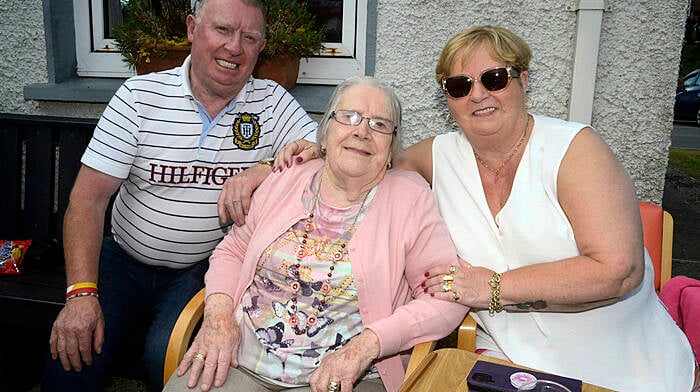 NEWS 28/7/2024 Pictured enjoying sunshine the Bandon community garden fete was Mary O'Donovan with Denis and Marian Reynolds. Picture Denis Boyle