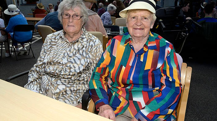 Maureen Meghen and Lena O'Mahony enjoying the sunshine at the Bandon community garden fete.   (Photo: Denis Boyle)