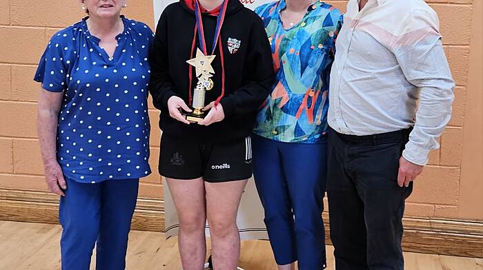 At the awards day at Carrigboy National School, the Ms Sandra Award was presented to Rachel Kelleher, the pupil who was judged to best reflect the attributes of the late Sandra Dukelow. From left: Helen Burke (chairperson, board of management) and Rachel Kelleher with her parents Marie and Jerry.