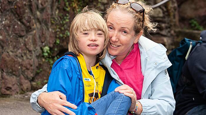 Oisin (11) and Mary Kelleher from Macroom at the end of the 2024 Tour de Munster Charity Cycle which was held on Patricks Hill, Cork City last Sunday. Cyclists completed the epic four-day, 600 km route across Munster raising vital funds for the Munster branches of Down Syndrome Ireland and were joined by cycling legend Sean Kelly.  (Photo: Diane Cusack)