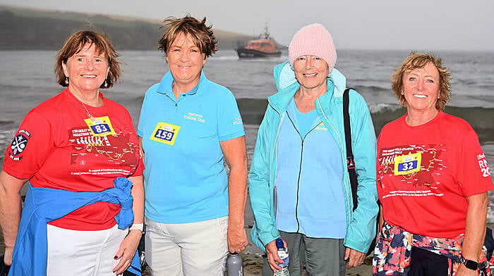 Ann Murphy from Lislevane, Eithne Lordan from Clonakilty, Helen Crilly from  Clonakilty and Noreen Fleming from the Seven Heads at Broadstarnd, Courmacsherry during the Great Wild Atlantic Marathon Walk last Sunday.   The Shannon-class RNLB Val Adnams can be seen in the background. (Photo: Martin Walsh)