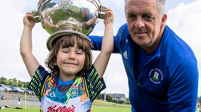 Castlehaven GAA Moneyvollahane Pitch. Friday 09th August 2024
Castlehaven held their 2024 Cul Camp this week with a huge turnout of 180 children. Here image an of Ciara Coughlan holding up the Andy Scannell Cup with James McCarthy. James was the manager of the Senior Men who lead them to win the cup last year.
Credit: Andrew Harris