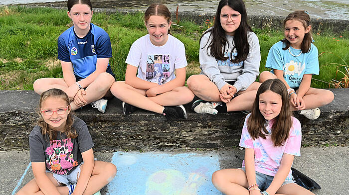 Local girls at the chalk drawing competition during the Courtmacsherry Harbour Festival were (back, from left) Amy Whelton, Sarah Madden, Faye Knowles and Darcy O’Donovan.  Front (from left) Remi O’Donovan and Katie May O’Driscoll.  (Photo: Martin Walsh)