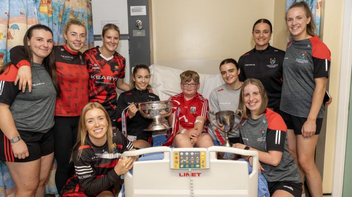 Cork players who won the Senior and Intermediate All-Ireland Camogie finals at Croke Park paid a surprise visit with the O’Duffy and McGrath Cups to CUH’s children’s wards on Friday. Twelve-year-old Aaron Jennings from Leap met his heroes in the Puffiin Ward. (Photo: Brian Lougheed)