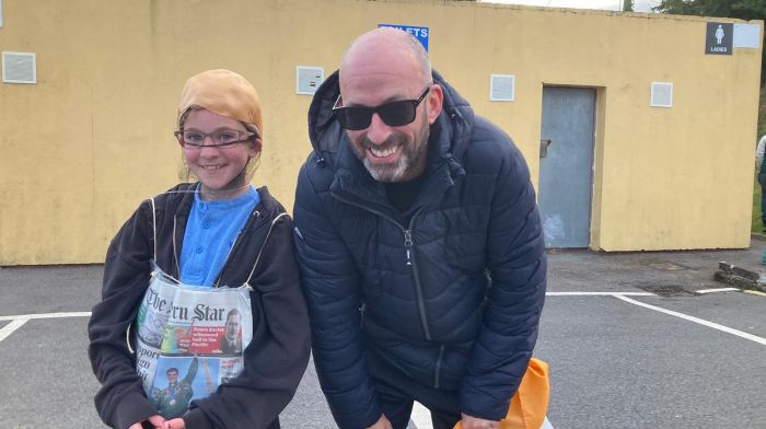 Sophie Bambury was at the fancy dress in Newcestown dressed as local Star reporter Kieran O'Mahony, right. Sophie was playing the part of a reporter on the 'Trump in Stormy weather' float.