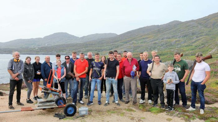 Participants and spectators at the inaugural Clay Pigeon shoot which was held at Dooneen on Sunday last as part of the Allihies family festival. Trophies were presented to the winners in O'Neill's bar afterwards. (Photo: Sean Moriarty).