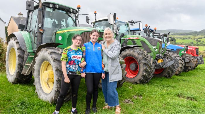 Éadaoin Hayes, Aoibhe McCarthy and Crona McCarthy (all Rossmore) enjoying their day at the Ballygurteen tractor, truck, car and bike run which started in Rossmore and was in aid of the 2D Haematology Ward CUH and the Bone Marrow for Leukaemia Trust. (Photo: David Patterson)