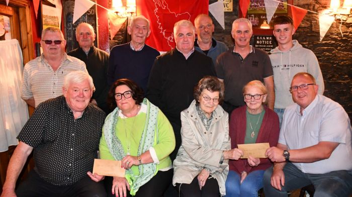 Barry O'Brien and Eddie Hodnett presenting the proceeds of the Ballydehob tractor, vintage car and motorbike run to Maureen Minihane (representing Bantry General Hospital) and to Nora O'Regan and Nelly Cotter (representing Schull Community Hospital) at a function in the Irish Whip in Ballydehob.  Also included are Dan Collins, Jerry Cronin, Dermot O'Donovan, Cllr Finbarr Harrington, Ben Deane, Jeremy and Conor Brosnan.   (Photo: Anne Minihane)