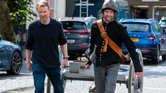 Historian Fergal Phillips from the Kinsale Cultural & Heritage Society and ‘Spanish artillery officer’ Ros Keddy from the Lord Edwards Own re-enactment society, pulling a cannon through Kinsale for a living history display showcasing clothing, weapons, and drills from the Battle of Kinsale as part of the 424th anniversary event for the battle. (Photo: John Allen)