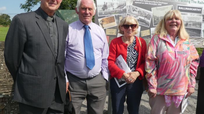 Canon John Kingston with Den, Catherine and Nora Keohane from Maulrour reminiscing about their old school days during a catch up a the unveiling of the Ballinascarthy Railway Timeline during National Heritage Week.