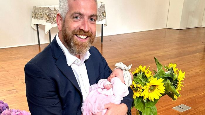 Christopher O’Sullivan TD enjoying some time with baby Lainey O’Flynn from Ballinascarthy at the official sunflower field opening day in aid of Marymount Hospice.