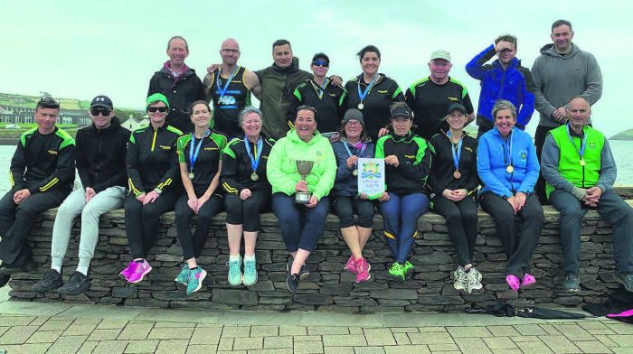 Members of the Kilmacabea Rowing Club who won several races at the recent All-Ireland
Coastal Rowing Championships in Dingle.   e small Glandore-based club, with just 20
members, travelled to Dingle where they won several events as well as four All-Ireland
titles.