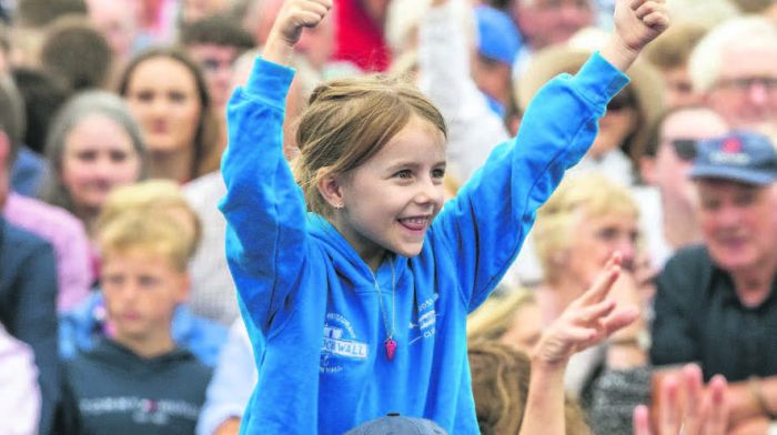 A young fan giving her heroes
the ‘thumbs-up’ (Photo: Andy Gibson)