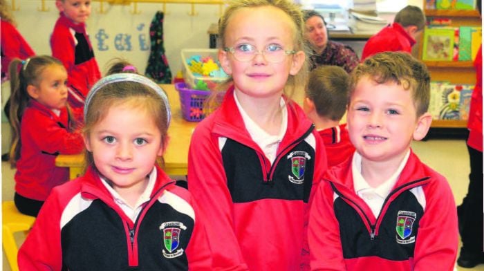 Enjoying the first day at Gaelscoil Dhroichead na Banndan were Fiadh Ní Dhonnabhaín, Sienna Guemar and Luke Ó Cróinin. (Photo: Denis Boyle)