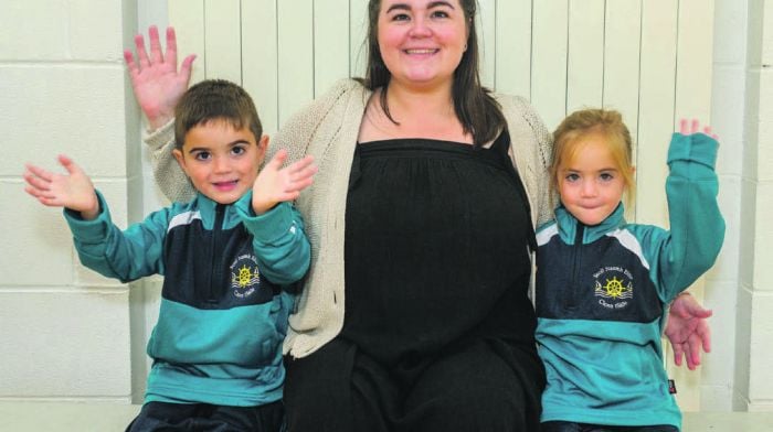 Scoil Naomh Eltin Kinsale twins Jack and Megan Farrugia from
Innishannon with their teacher Donna Dowling.
(Photo: John Allen)