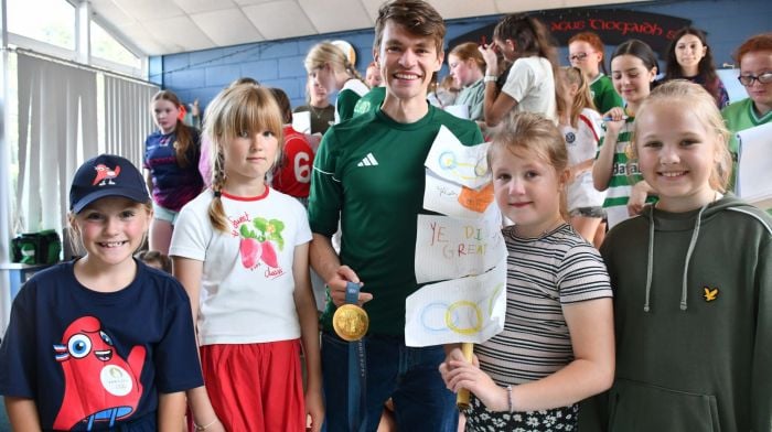 Olympic gold medalist Fintan McCarthy with Emily Collins, Hannah Pylak, Zuzia Wanloch, Rebeka Jancauskaite when Fintan and fellow Olympians Emily Hegarty and Aoife Casey visited St Joseph's National School in Skibbereen recently.(Photo: Anne Minihane)