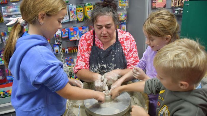 Bea and Lucas O'Mahony and Fiadh Limrick having a brilliant time with Suzanne O'Connor from Cré Pottery Studio at Cathal O'Donovan's Skibbereen Bookshop on Culture Night. (Photo: Anne Minihane)