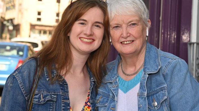 Róisín O’Brien (left)  from Clonakilty and Ruya Jackson from Drimoleague enjoying some time together on Rossa Street in Clonakilty.   (Photo: Martin Walsh)