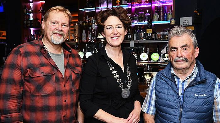 Cllr Gillian Coughlan deputising for county mayor Cllr Joe Carroll at last weekend’s Courtmacsherry Songs and Stories by the Sea with modern-day Seanchaí Colin Urwin (left) from Antrim and Denis Cahalane, Courtmacsherry.  (Photo: Martin Walsh)