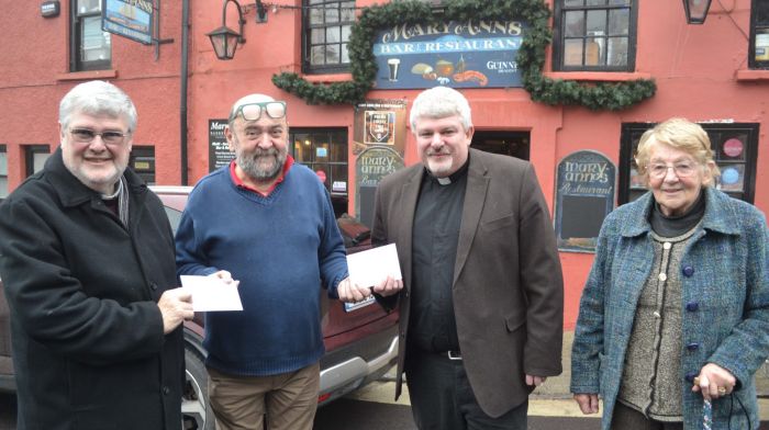 Fergus O’Mahony of Mary Ann’s in Castletownshend making presentations to Fr Bernard Cotter PP and Rev John Ardis. The money was raised through the Christmas and New Year draw at Mary Ann’s and was presented to both St Barrahane’s churches in Castlehaven parish and Castletownshend. Also included is Freda Salter Townshend, treasurer, St Barrahane’s Church, Castletownshend. (Photo: Anne Minihane)