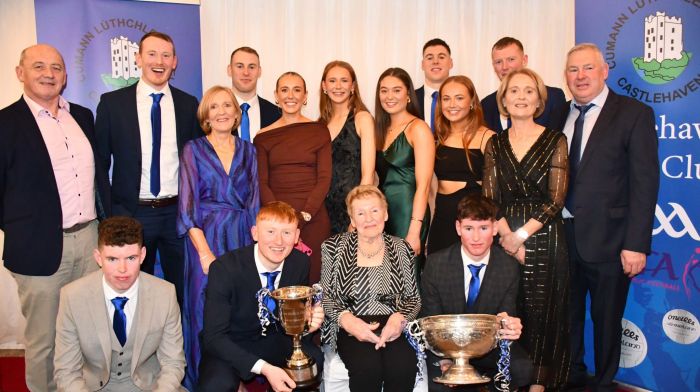 Kathleen Cleary with some of her extended family at the celebration dinner for Castlehaven GAA and LGFA club at the West Cork Hotel. Back from left, Niall Cahalane, Damien Cahalane, Ailish Cahalane, Cathal Maguire, Grainne Cahalane, Kate Cahalane, Ellen Maguire, Rory Maguire, Orlaith Cahalane, Conor Cahalane, Deirdre Maguire and Mike Maguire. Front from left, Eoin Maguire, Jack Cahane, Kathleen Cleary and Micheál Maguire.(Photo: Anne Minihane)