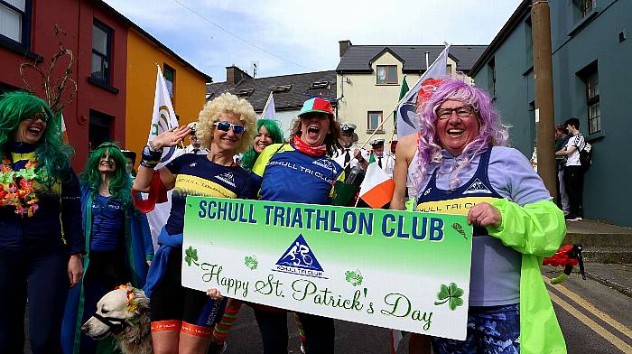 Members of Schull Triathlon Club Sarah Mc Knight, Deirdre Ní Challanain and Catherine Arundel enjoying the St Patrick's day parade. (Photo: Carlos Benlayo)