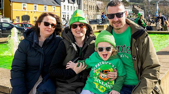 Bantry, West Cork, Ireland. 17th Mar, 2024. The sun shone today as the community came together for the Bantry St. Patrick's Day parade. Thousands of people from across Ireland were present to watch the parade. Enjoying the day were Laura Naretti, Dunmanway; Marianne Walsh, Cork and Benjamin & Jan Schubert, Dunmanway. Picture: Andy Gibson.