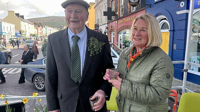 Bantry’s grand marshal Florrie O’Driscoll with Eileen O’Shea, chairperson Bantry Goes Green Festival 2024. Right: Mairead, Emma, Sarah and Damien Madden at Courtmacsherry’s parade. (Photo: Martin Walsh)