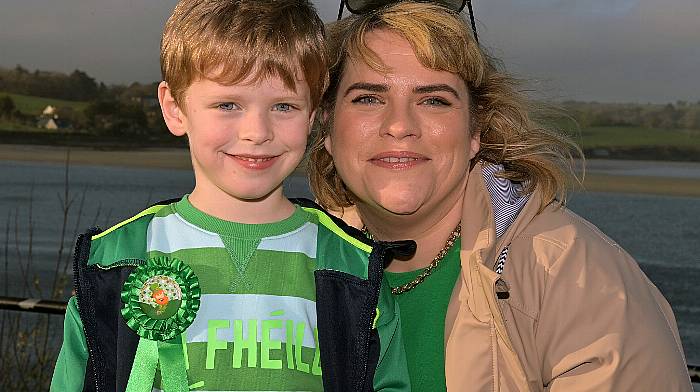 Jamie Buckley from Lislevane with his mum Ellen at the Courtmacsherry St. Patrick’s Day parade.  Photo: Martin Walsh.