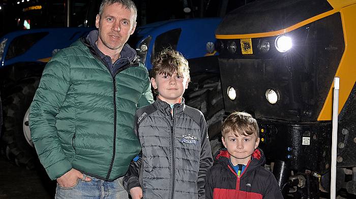 Enjoying the Courtmacsherry Rowing Club’s fundraising tractor run were (left to right): Michael, Conan and Josh O’Regan, Knockbrown.  Photo: Martin Walsh.