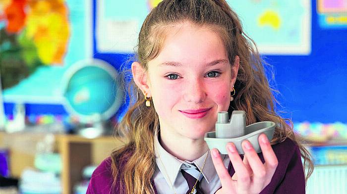 Laoibhse Hayes, Ballinacarriga National School, at the announcement that Ballinacarriga NS and Drinagh NS were named
among the winners of ‘Manufacturing a Healthy Future’ – a 3D printing design challenge.   e school used the printer to
to extend the life of the chairs in their classroom. (Photo: Michael O'Sullivan)