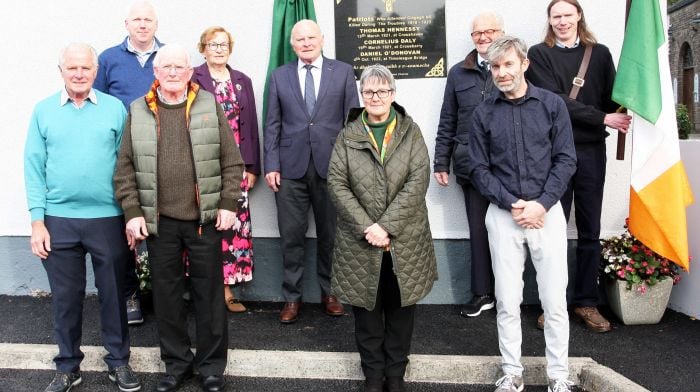 At the historic unveiling of the three patriots plaque on Clogagh old school wall are members of the Ballinascarthy/Clogagh historical committee: Back (from left): Pat Walsh, Betty Hennessy, JJ Walsh, Patrick Hennessy and Patrick Keane.  Front (from left): Tony Walsh, John Finn, Kate Crowley and Conor Keane.