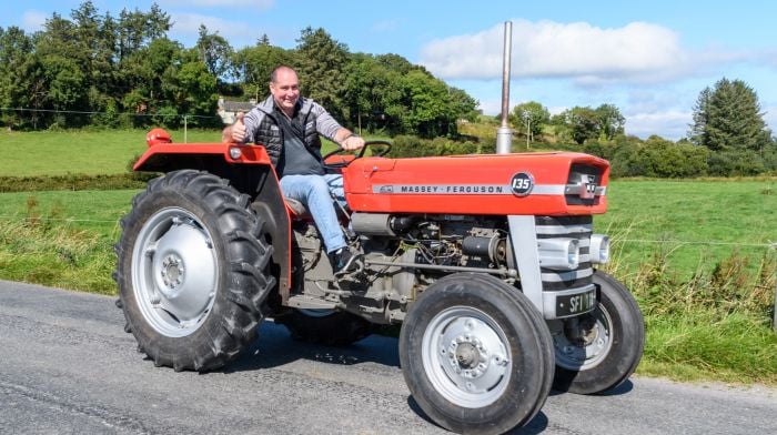 Finbarr McCarthy from Caheragh enjoying the sunshine driving a Massey Ferguson 135 at the Caheragh tractor, car, truck and motorcycle run which was held in aid of West Cork Rapid Response/Dr Jason’s Jeep.  (Photo: David Patterson)