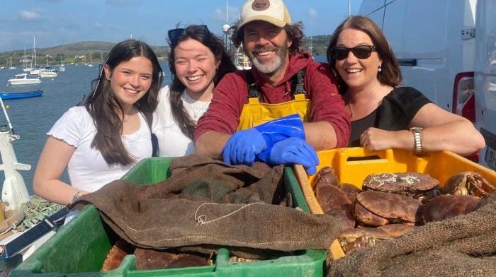 The O’Driscoll family, Olivia, Chloe, Sean and Cllr Caroline Cronin on the pier in Schull collecting the freshest of raw materials for Sean Óg’s summer fish and chip wagon which has now closed for the winter but will return in spring.