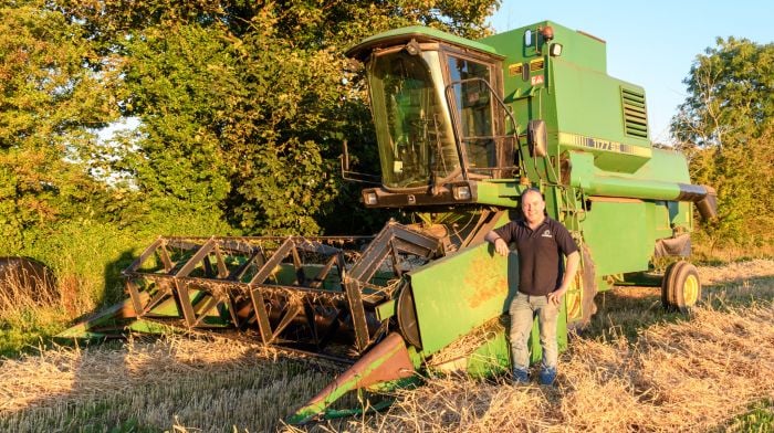 Denis Kelleher of Duggan’s Contractors (Dunmanway) taking a break from harvesting a 15-acre field of spring wheat on a recent sunny afternoon in Dunmanway with a John Deere 1177 SII combine. (Photo: David Patterson)