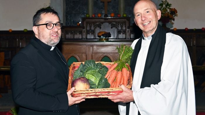 Rev Kingsley Sutton (right) at the harvest thanksgiving ceremony in Kilgarriffe Church, Clonakilty last Friday night with guest preacher Fr Fergus Ryan, who is resident in Barryroe.  (Photo: Martin Walsh)