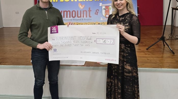 Ballinascarthy GAA, in partnership with Marymount Hospice, presented the cheques from the Pick and Donate sunflowers at an event last Friday night in the community hall.  A total of €11,741.22 was presented to Edith Conway for Marymount Hospice by Cathal Nyhan, treasurer of Ballinascarthy GAA and  total of €11,280.78 was presented to Michael Ryan for Ballinascarthy GAA.