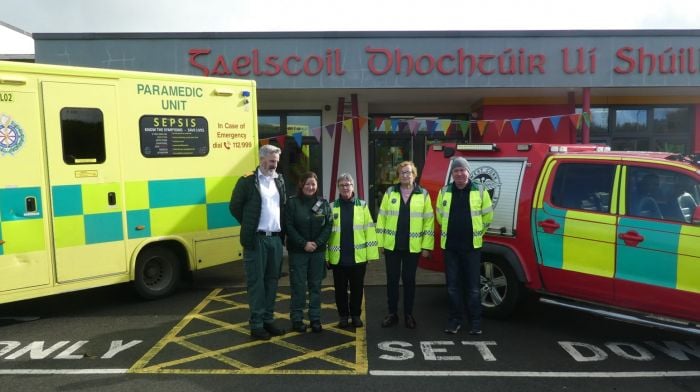 The ambulance and West Cork Rapid Response jeep at Gaelscoil Dhochtúir Uí Shúilleabháin in Skibbereen last week when they both visited the school so the children could explore the vehicles.  From left: James Hennessy AP, Anne Berry NAS and Kate Crowley, Betty Hennessy and Liam Slattery, all WCRR.