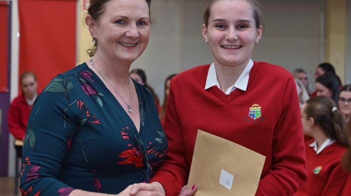 Kerry Coombes getting her results from Ann Marie Brosnan, principal of Clonakilty Sacred Heart Secondary School. (Photo: Martin Walsh)