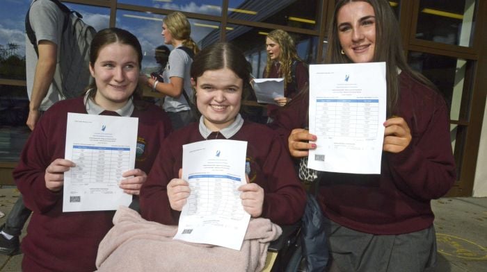 Celebrating their results at St Brogan's College in Bandon were Tegan McCarthy, Ella Coomey and Niamh O'Mahony. Right: Amy Babes and Isabel Cahalane at St Brogan's. (Photos: Denis Boyle)