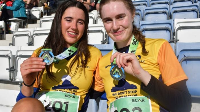 Zoe Doyle from Rosscarbery and Aoife Kearney, Barryroe after they finished SCAR Taster event enjoying the sunshine at the finish at Castlehaven GAA Club. (Photo: Anne Minihane)