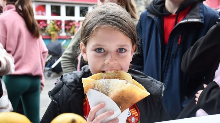 Katie O'Sullivan from Dreeny enjoying her chocolate crepe at the Caheragh Threshing. (Photo: Anne Minihane)