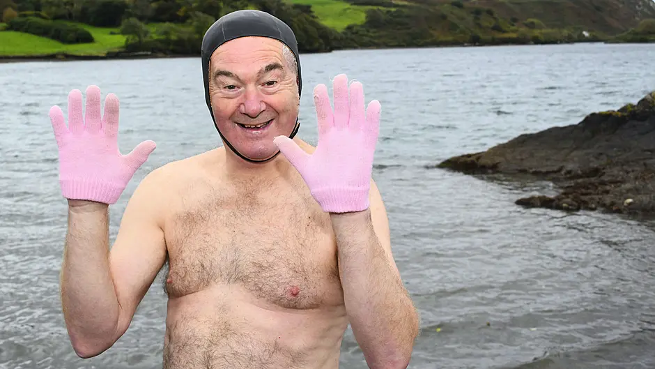 Declan McCarthy from Skibbereen all decked out in his pInk gloves for the Swim in Pink at Lough Hyne. (Photo: Garry Minihane)