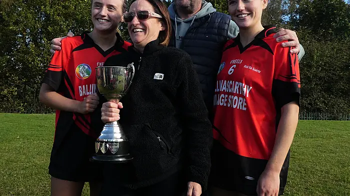 It was a wonderful day for the Condon family when Millie was awarded Player of the Final while her sister Annie captained the victorious premier junior A camogie team. From left: Mille Condon with her mam Claire, dad Jack and sister Annie.