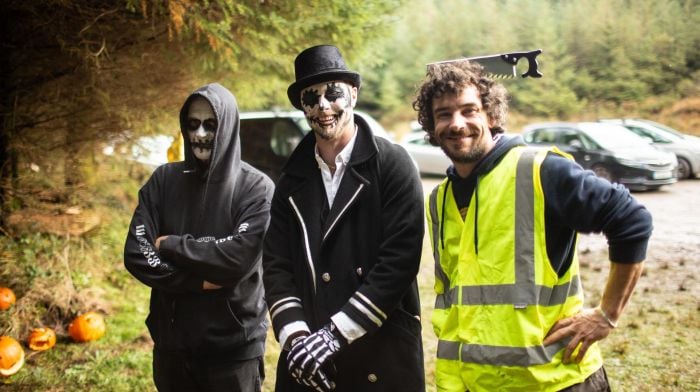 Quentin Gargan, Ciaran Seawright and Jacob Lane welcoming walkers to the Mealagh Valley Haunted Trail fundraiser which was held in aid of Dromclough National School.    (Photo: Adrain O'Neill)